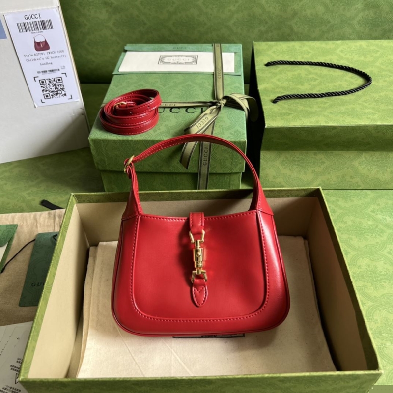 G*u*i top handle bags